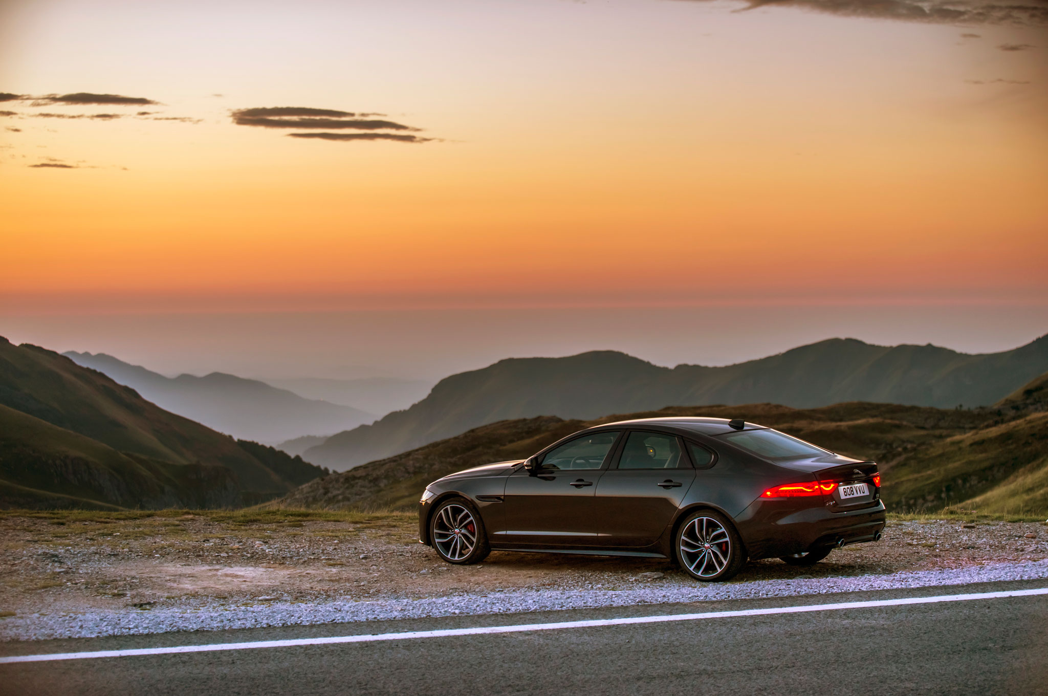 Jaguar Extends Warranty Coverage Free Maintenance For All 2016 Models 2016 Jaguar Xf S Awd Rear Side View Sunset